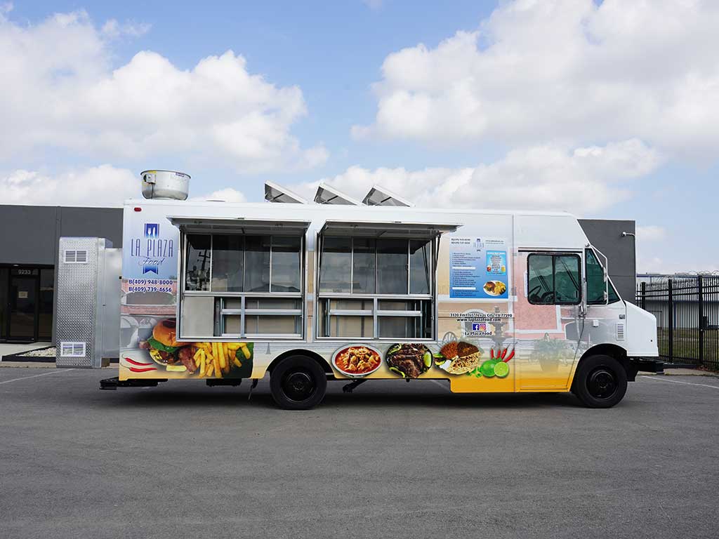 The customized food truck from Jerusalem Company has two catering windows and three openings in the roof