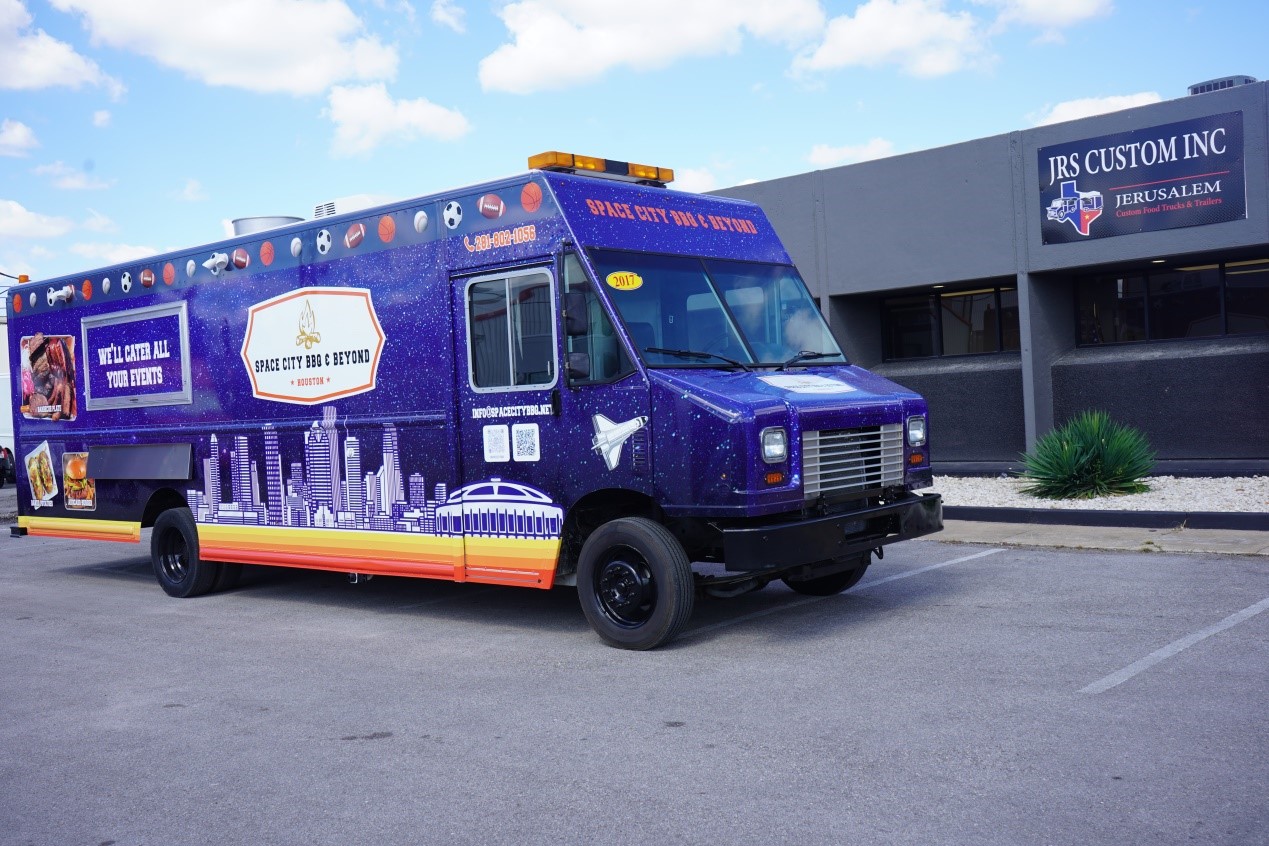 space city bbq food truck in front of the JRS Custom Food Trucks & Trailers office