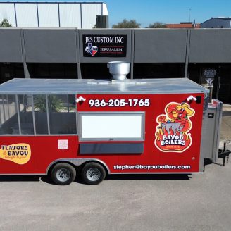 bayou boilers food trailer in front of the JRS Custom Food Trucks and Trailers office