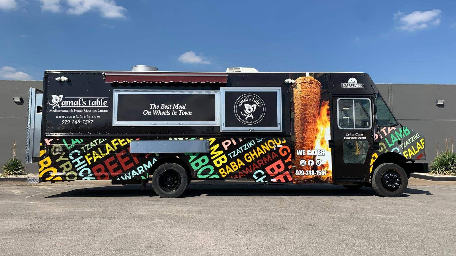 amal's table black food truck with graphics built and designed by jrs