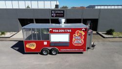 bayou boilers food trailer in front of the JRS Custom Food Trucks and Trailers office