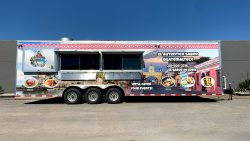 el autentico sabor guatemalteco food trailer in front of the JRS Custom Food Trucks and Trailers office