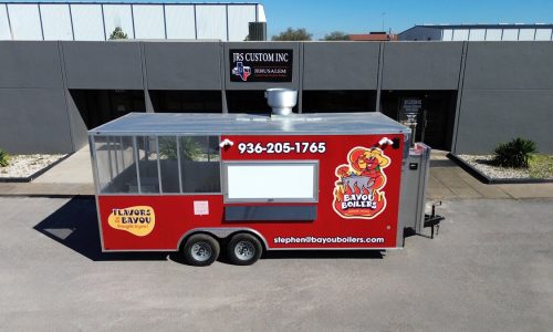 bayou boilers food trailer in front of the JRS Custom Food Trucks and Trailers office