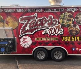 Tacos Al 100% Mexican food trailer with a bold red wrap featuring large food photography, menu items including nachos, burritos, and quesatacos, phone number, and social media icons, with an external generator mounted on the side