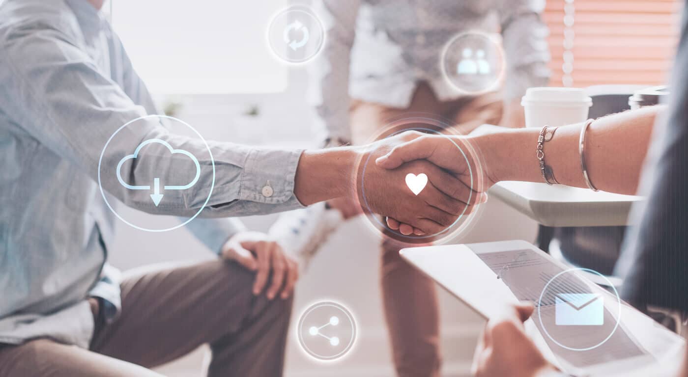 a pair of hands shaking illustrating customer relationships