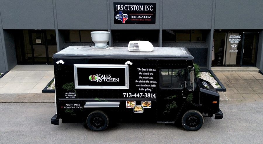 Kale's Kitchen plant-based food truck parked in front of the JRS Custom Food Trucks and Trailers facility in Houston